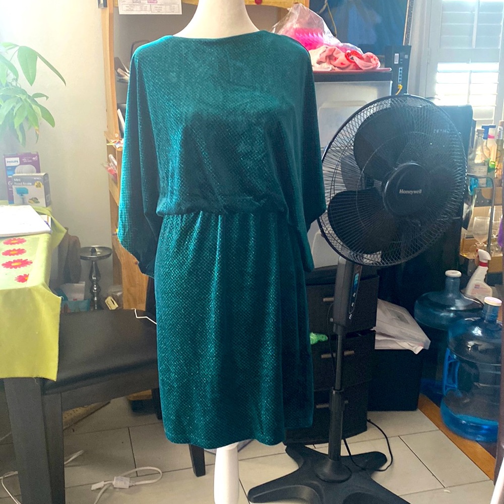Selling this sparkling green dress for any party.